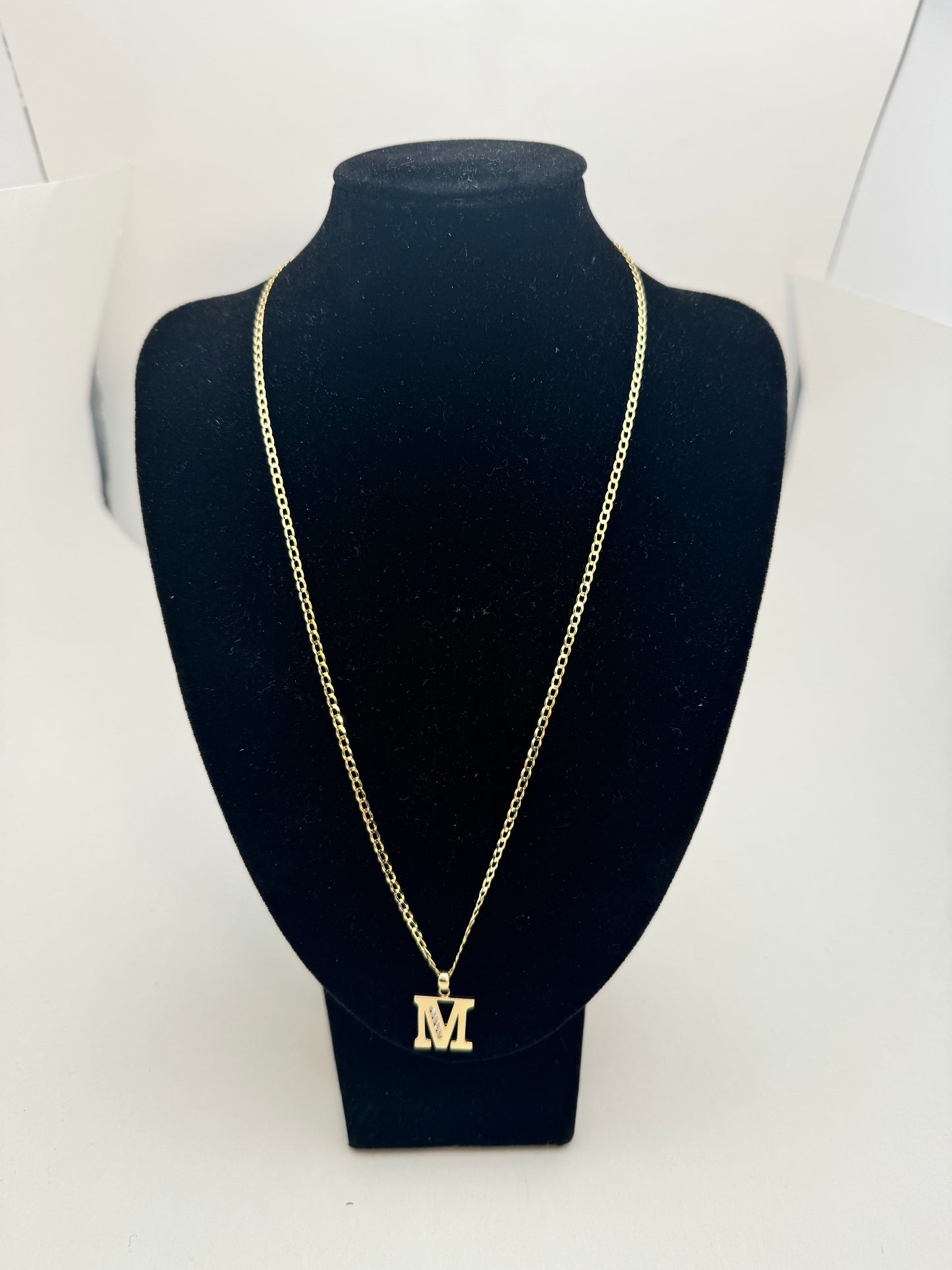 14 karat gold Cuban link chain with M pendant, yellow gold