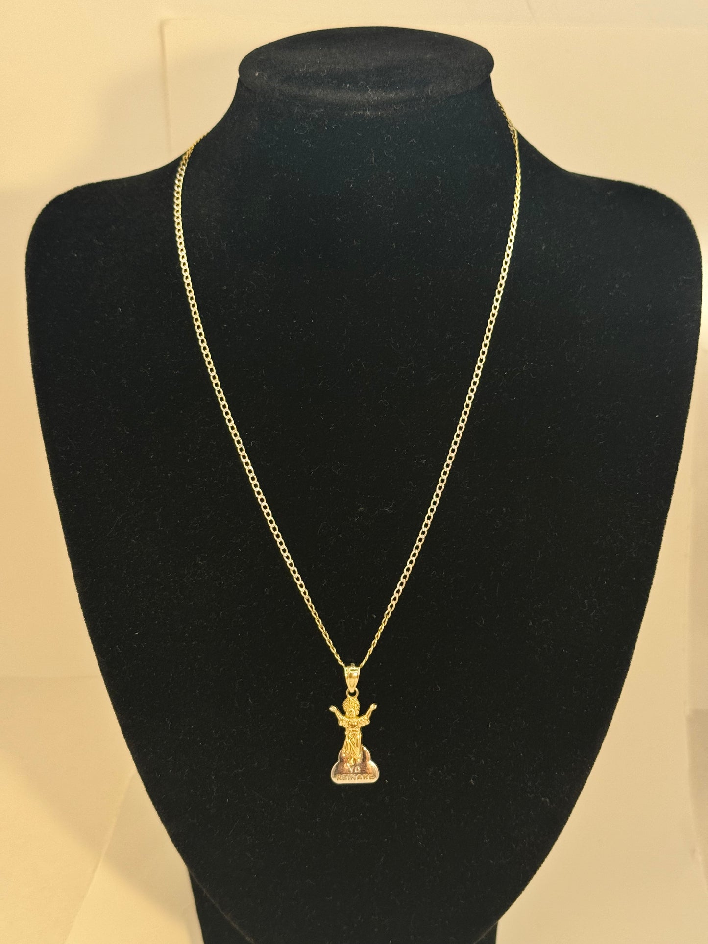 14k gold 2 tone Cuban link chain with Devine child pendant