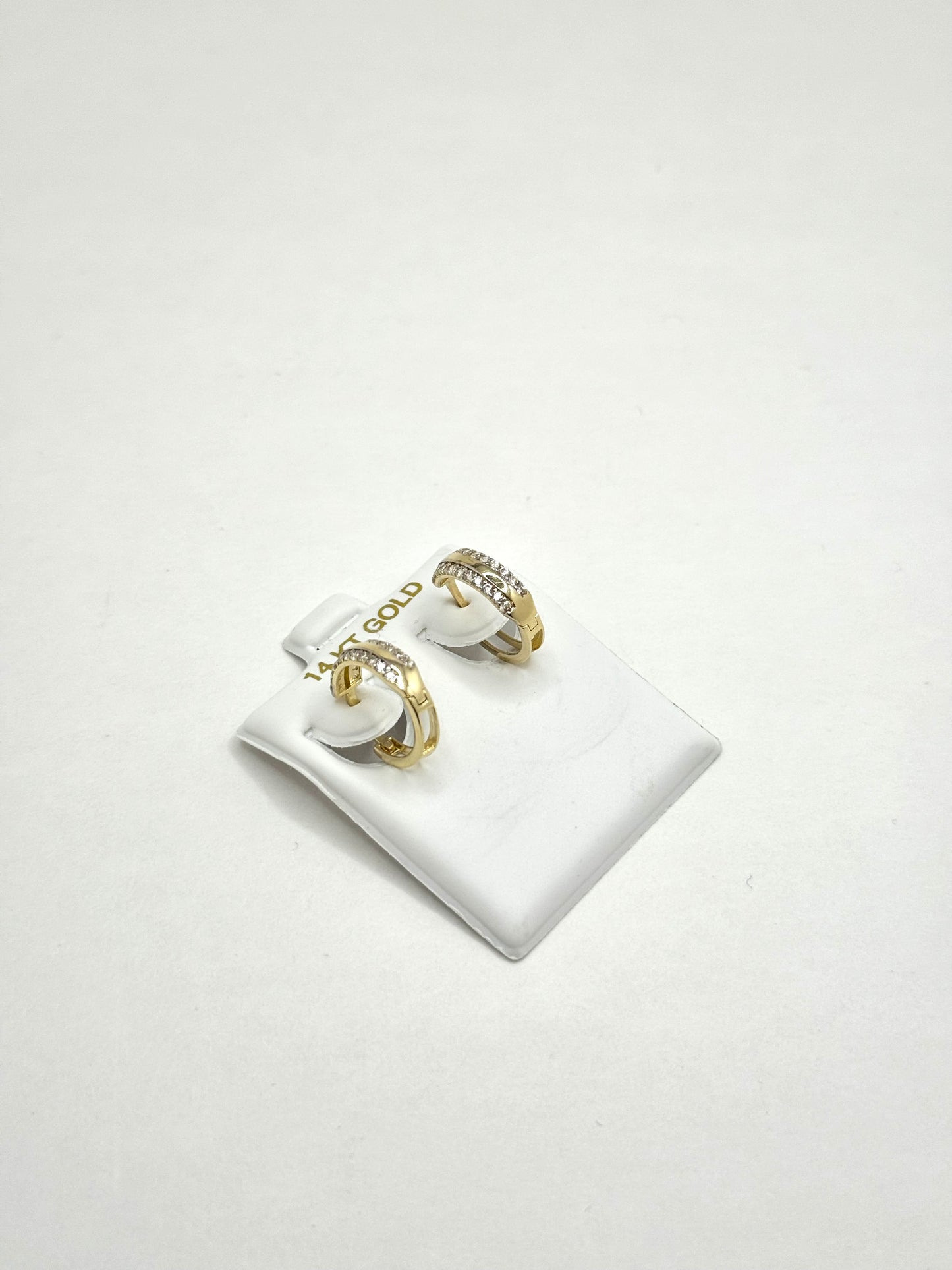 14K gold round Huggie Earrings with cubic zirconia