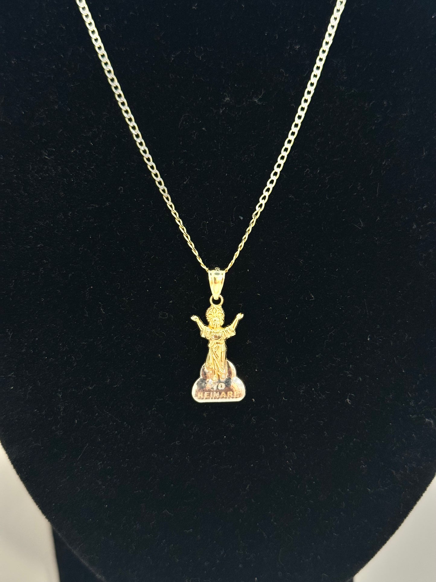 14k gold 2 tone Cuban link chain with Devine child pendant