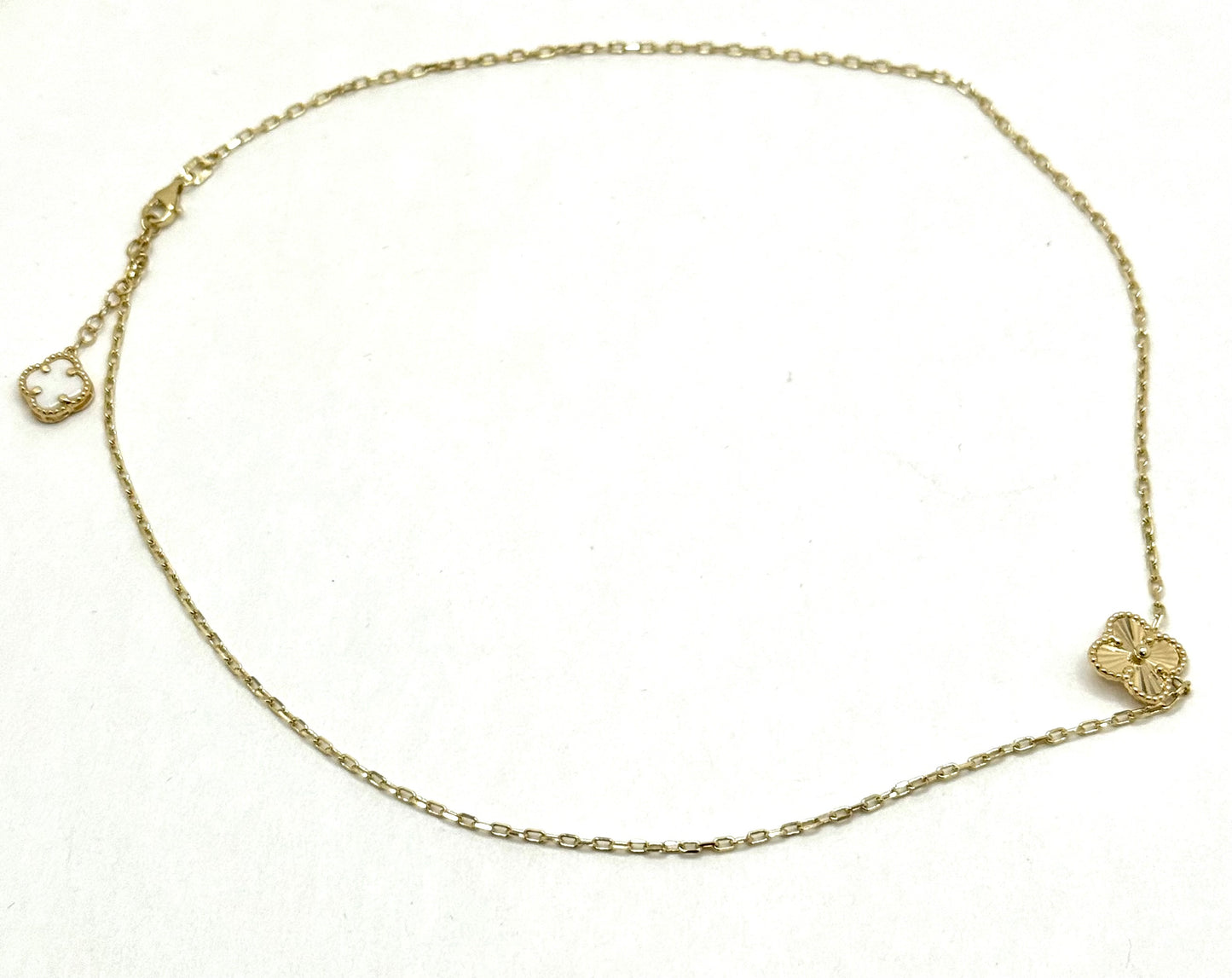 16-inch 14K yellow gold chain and a matching 8-inch bracelet inspired by the timeless Van Cleef design